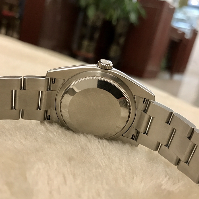 Rolex 劳力士 蚝式恒动系列，116034。36毫米表径，18K白金牙圈，银色面盘唱片面，阿拉伯数字时标。自动上弦机械机芯。专柜定价：52000元。 单表无附件。