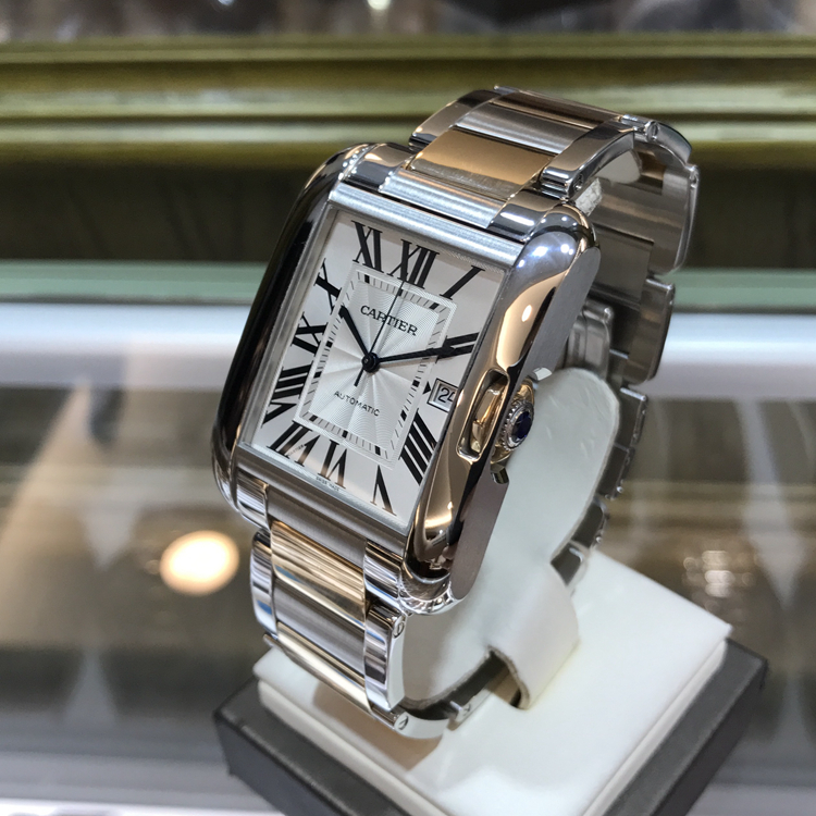 Cartier 卡地亚 Tank 坦克系列，W5310006。47x36.2毫米表径，精钢/18K玫瑰金表壳，镀银表盘，三点位置视窗式日期显示，自动上弦机械机芯。专柜定价：83500元。 单表无附件。