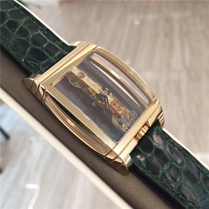 CORUM 昆仑 CORUM  Bridges 昆仑桥系列，113.550.55/0001。32x50毫米表径，全镂空酒桶形，18k玫瑰金壳扣。CO113 自产手动上弦机械机芯，动力储备40小时。 